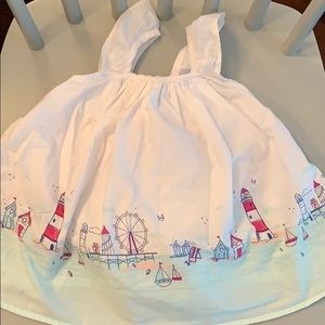 White dress with seaside illustration